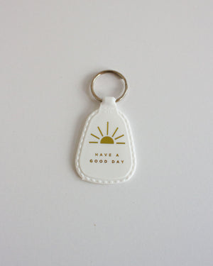 
            
                Load image into Gallery viewer, CONFETTI RIOT - HAVE A GOOD DAY KEYCHAIN
            
        